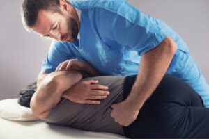 Chiropractor treating patient